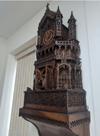 Wooden-carved-mechanical-clock