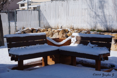 snow-covered-benches